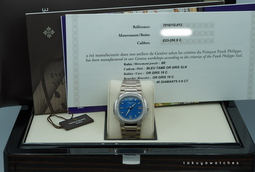 FSOT:BNIB Patek PHILIPPE NAUTILUS 7010/1G WHITE GOLD LIGHT BLUE DIAL DIAMOND 2025 FULL SET image 2
